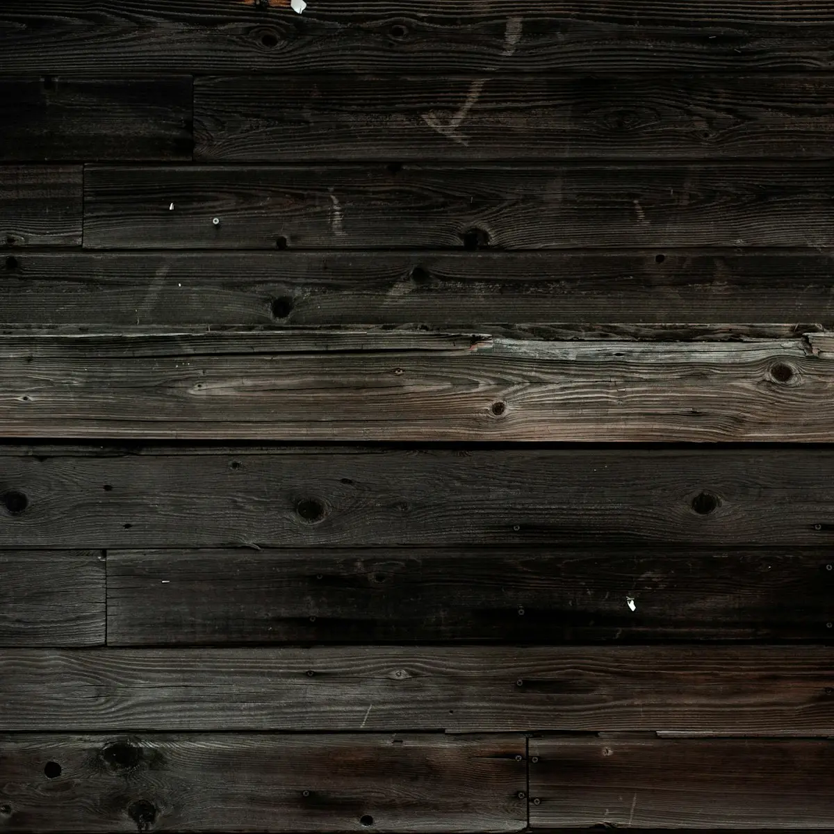 Reclaimed ebonised barn boards