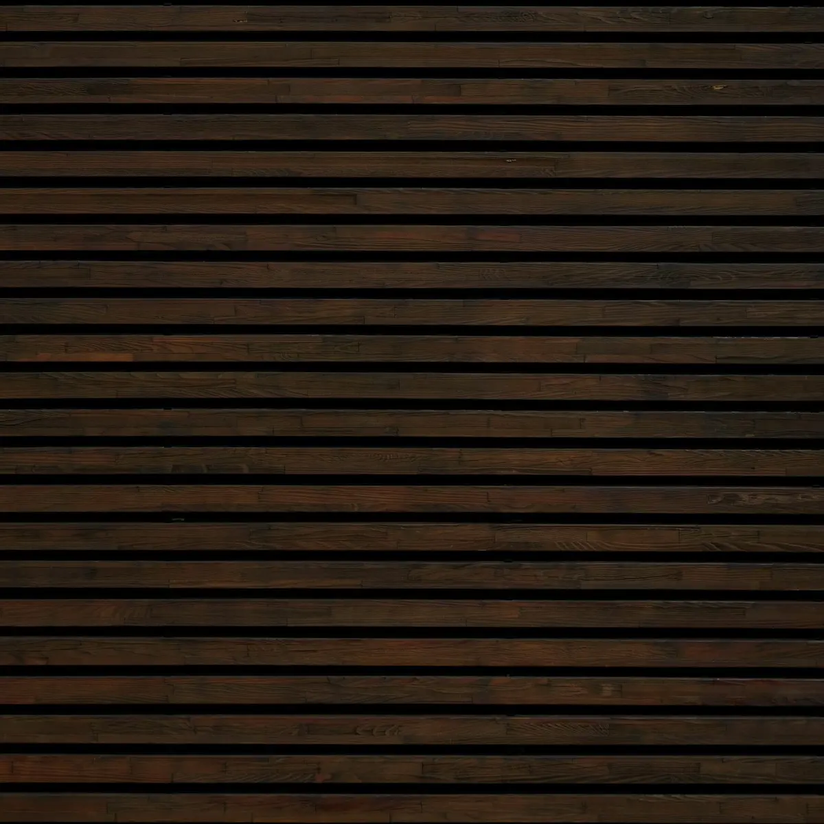 Dark hardwood batten screen with shadow gaps
