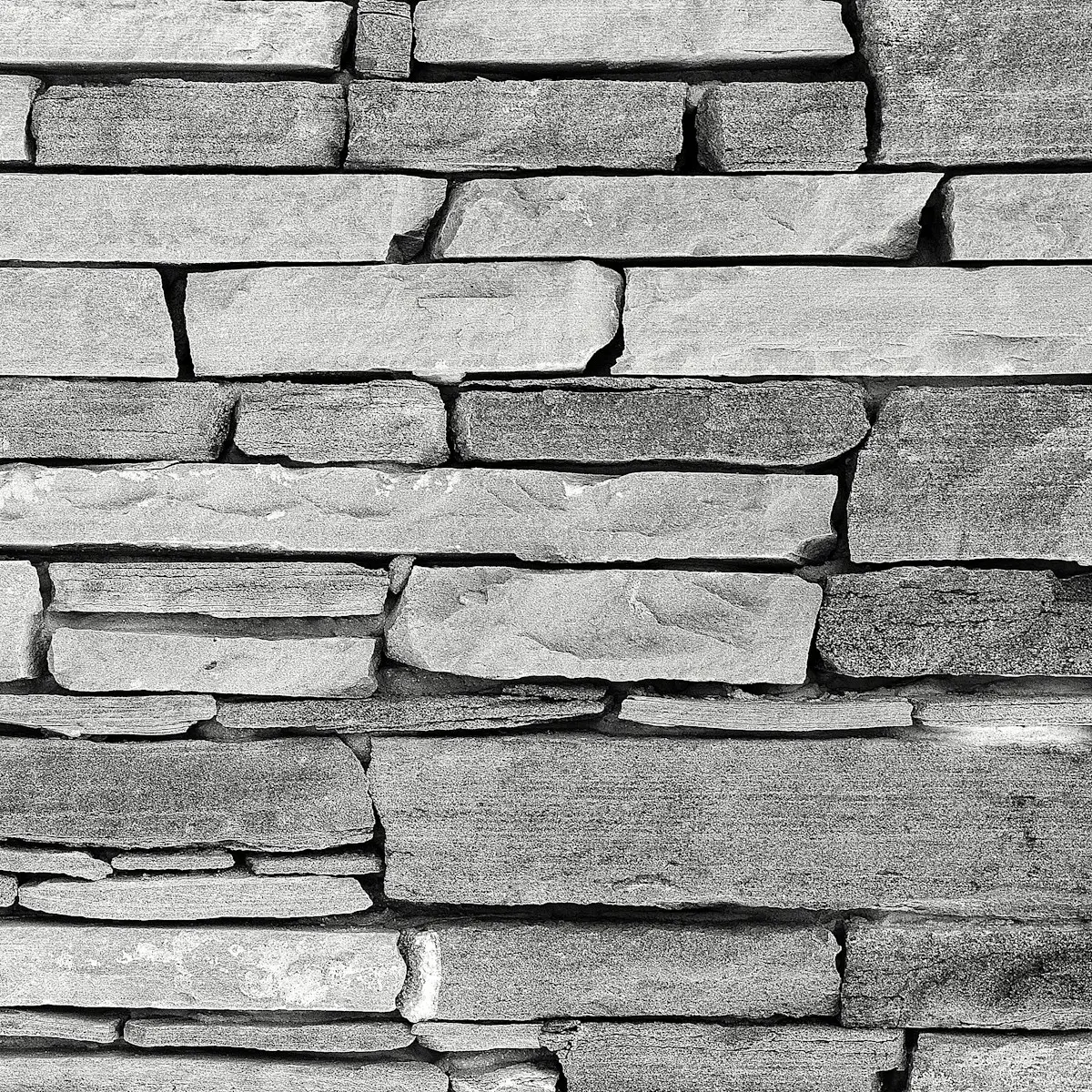 Silver-grey split-stone ledge cladding