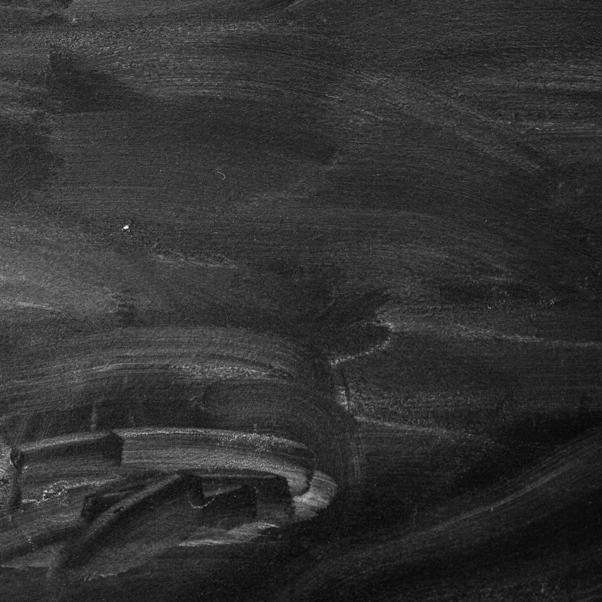 Soft black limewashed surface
