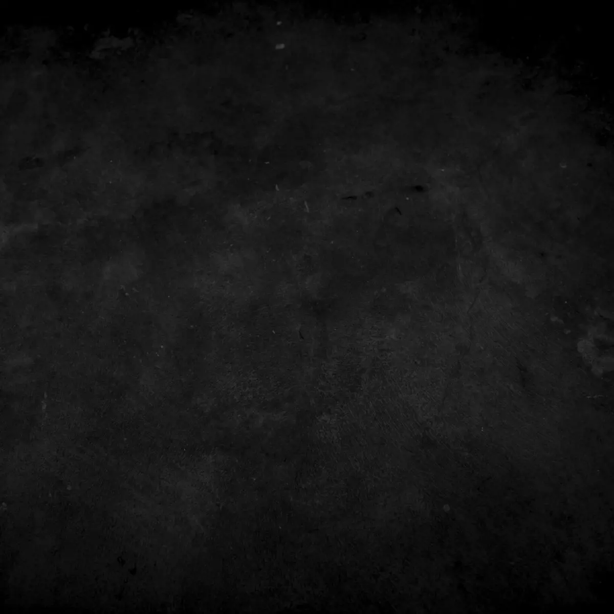 Dark shadowed concrete surface