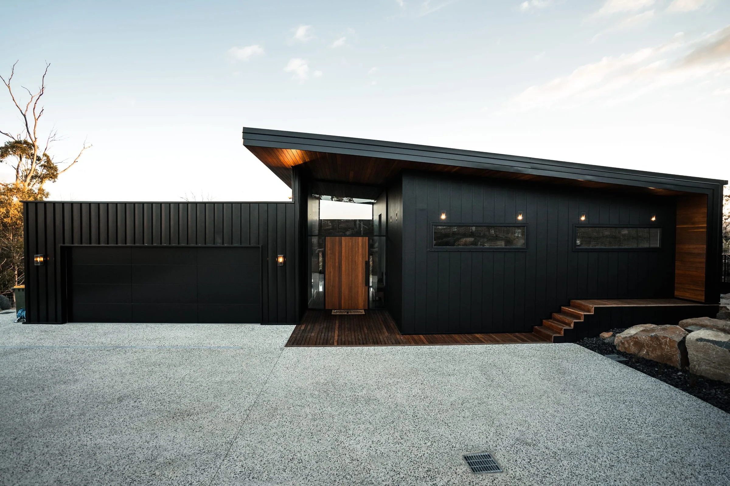 The HQ — a black commercial headquarters building